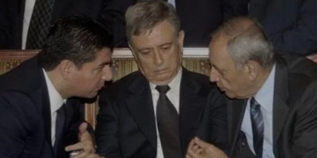 syrian vice president abdul halim khaddam, center, listens to bahaa hariri, son of the slain former prime minister