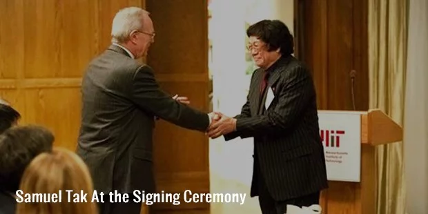 samuel tak at the signing ceremony