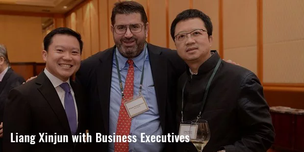liang xinjun with business executives liang xinjun with business executives